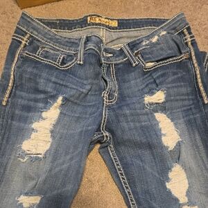 Women’s Distressed Blue Jeans